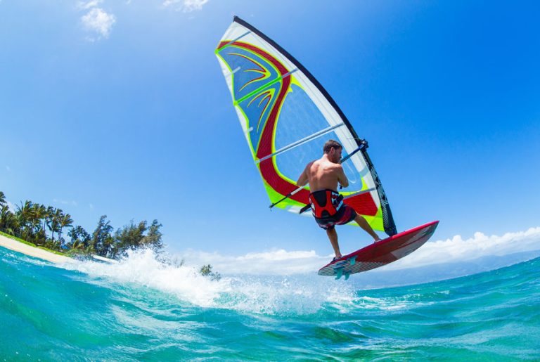 Down South Explore 5 A foreign boy windsurfing on the waves enjoying one of the most exciting water sports in Sri Lanka